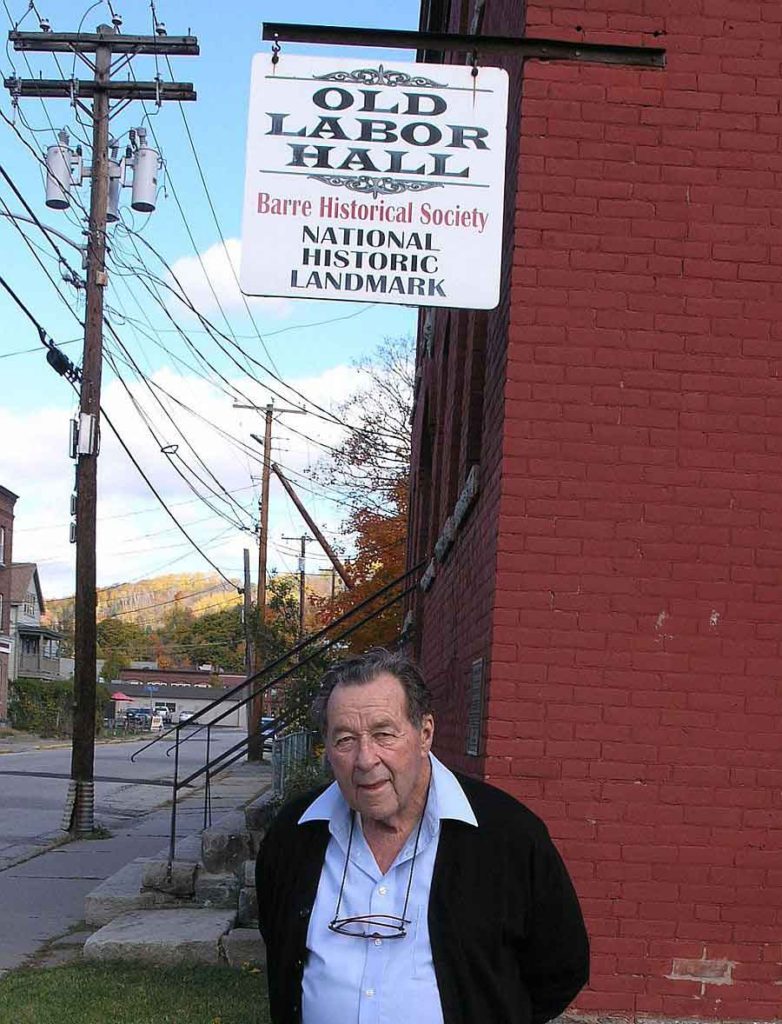 Tom Davis in front of the Old Labor Hall (photo Mark Greenberg)