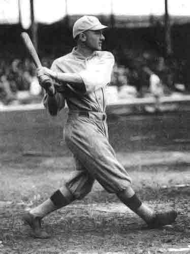 Lary Gardner swinging a bat